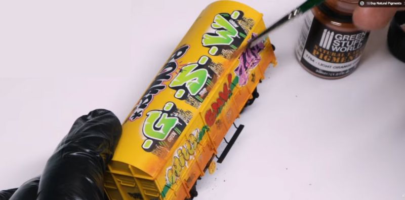 Pigments d'oxyde par-dessus les décalcomanies